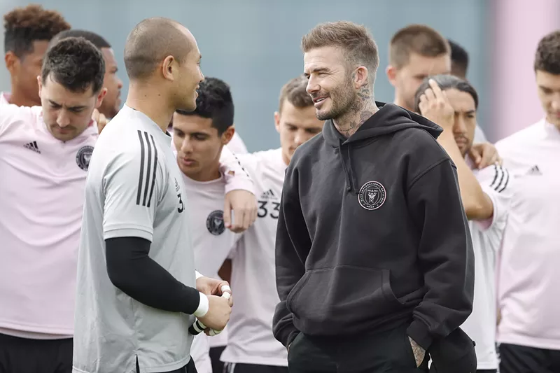 Image: David Beckham (right), Inter Miami's owner and president of soccer operations, talks with goalie Luis Robles.