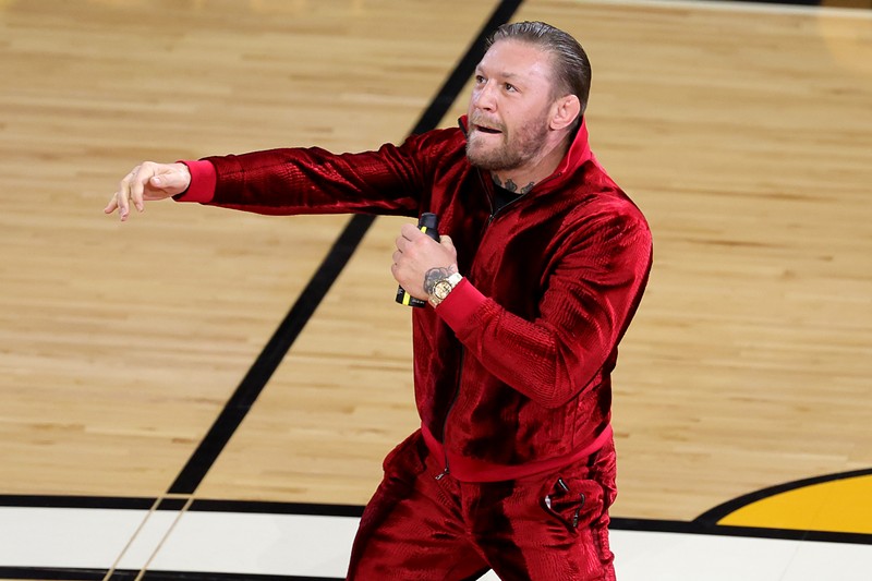 Conor McGregor is seen on the court during a timeout in Game 4 of the 2023 NBA Finals at the Kaseya Center on June 09, 2023, in Miami, Florida.