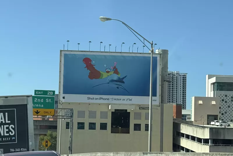 Image: An Apple ad features a phallic-shaped image on I-95 in Miami.