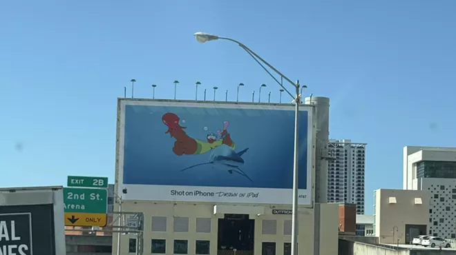 An Apple ad features a phallic-shaped image on I-95 in Miami.