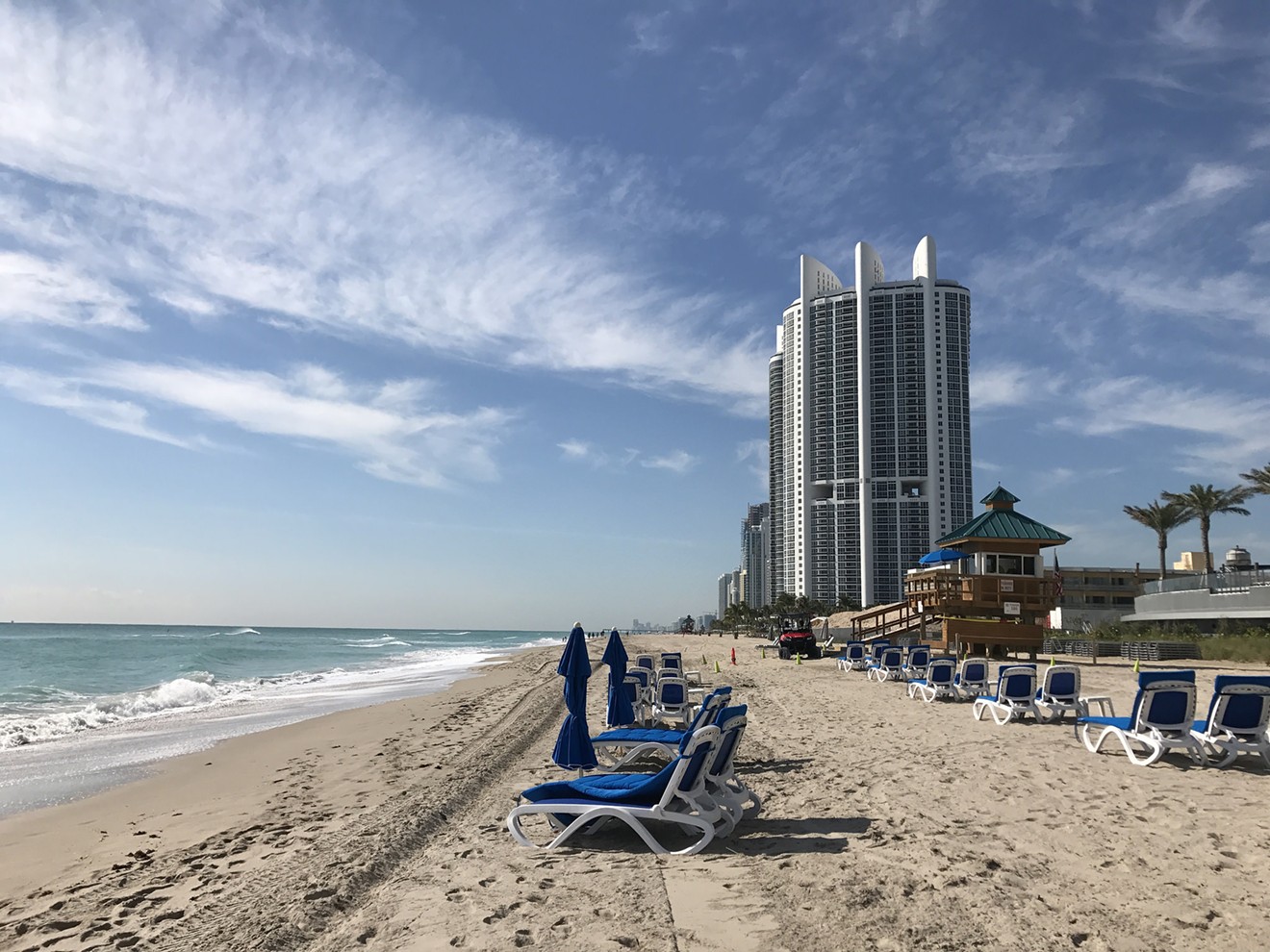 The Trump International Beach Resort overlooks the sand in Sunny Isles Beach.