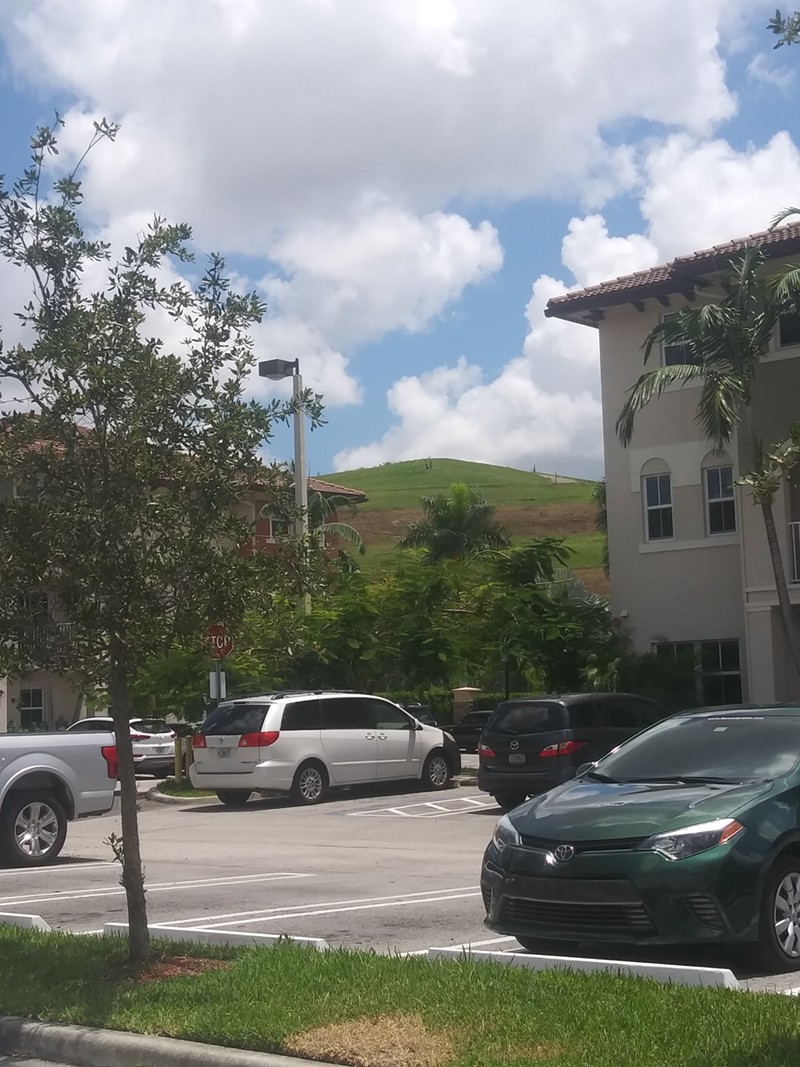 View of the Medley Landfill, AKA "Mount Trashmore," from the parking lot of the St. Maarten condo complex in Doral.