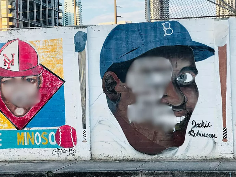Image: Blurred photo of vandalized Jackie Robinson mural