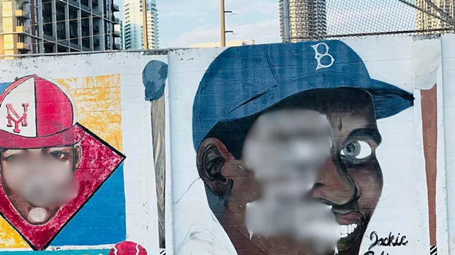 Blurred photo of vandalized Jackie Robinson mural