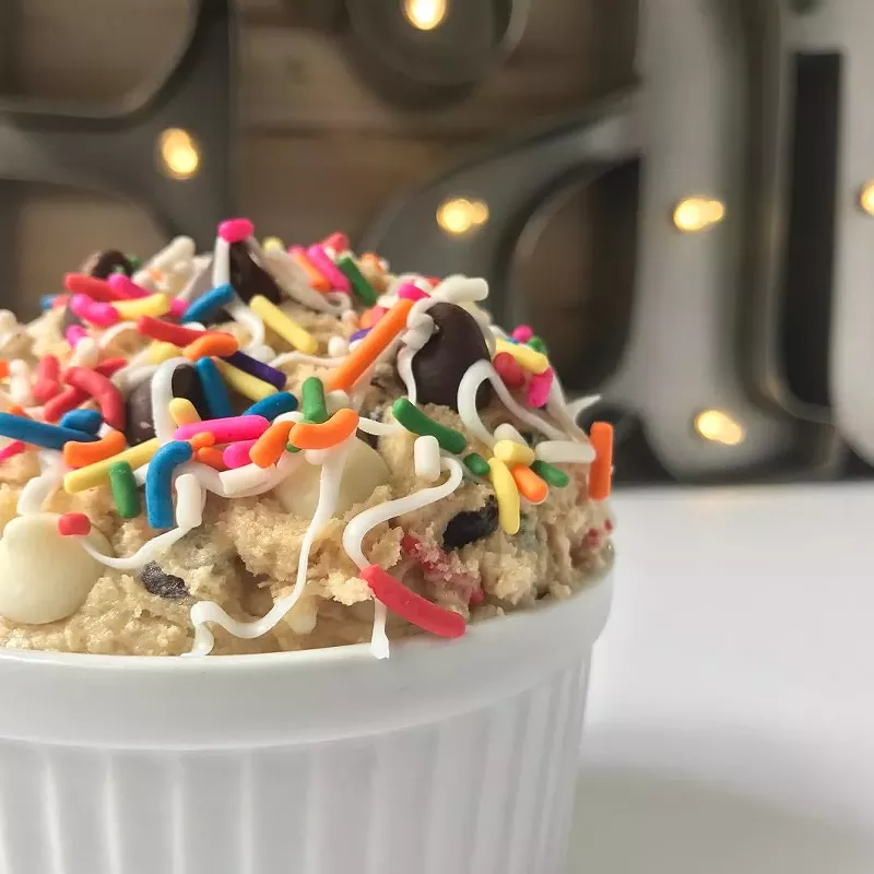 Image: Happy Birthday Dough You: Edible cookie dough with rainbow sprinkles, white and semisweet chocolate chips, and vanilla icing.
