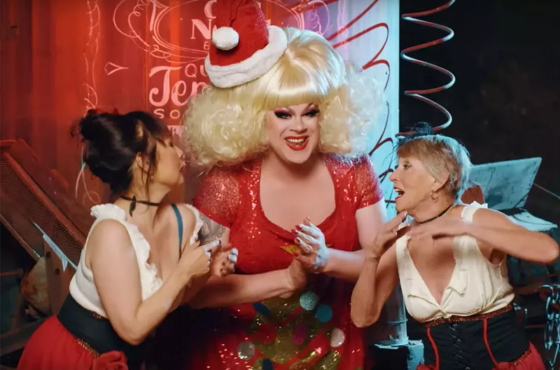 Image: Longtime drag performer Nina West (center) will host this year's A Drag Queen Christmas.