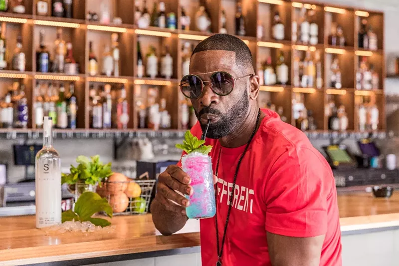 Image: Dwyane Wade Sr. drinking for a cause.