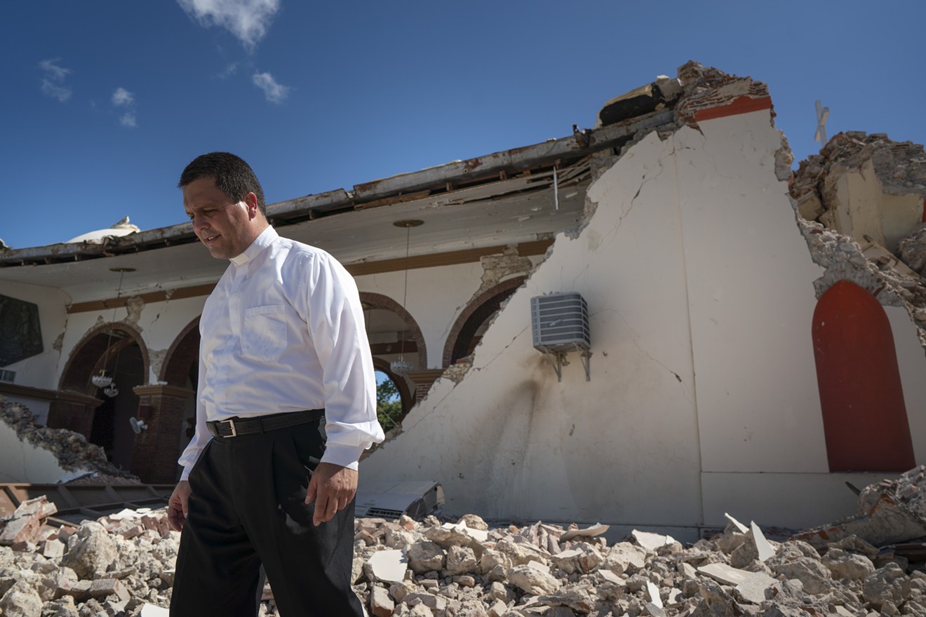 Father Melvin Diaz Aponte inspects damage to a church after a 6.4 earthquake hit Guayanilla, Puerto Rico.