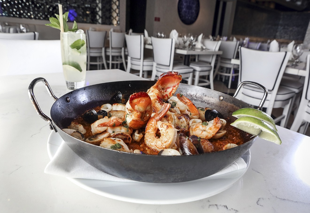 For the seafood paella for two, saffron rice is cooked in criollo. See more photos from Estefan Kitchen in the Design District.