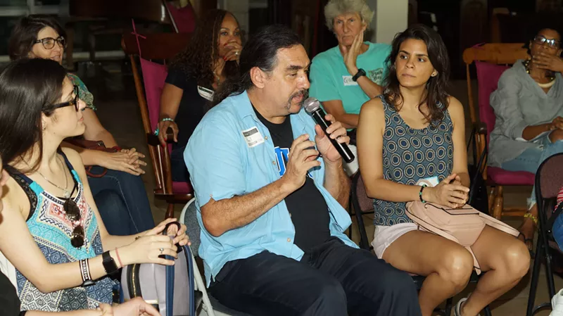 Image: Paul Ortiz participaties in a Latinx small-group discussion at St. Stephen's Episcopal Church in Coconut Grove September 7.
