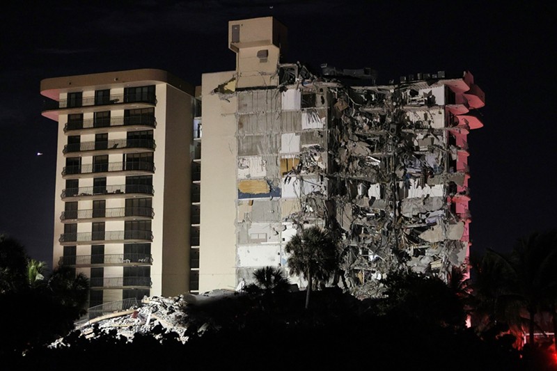 A portion of the 12-story condo tower crumbled to the ground during a partial collapse of the building.