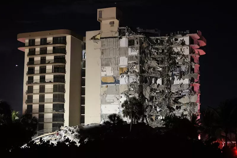 Image: A portion of the 12-story condo tower crumbled to the ground during a partial collapse of the building.