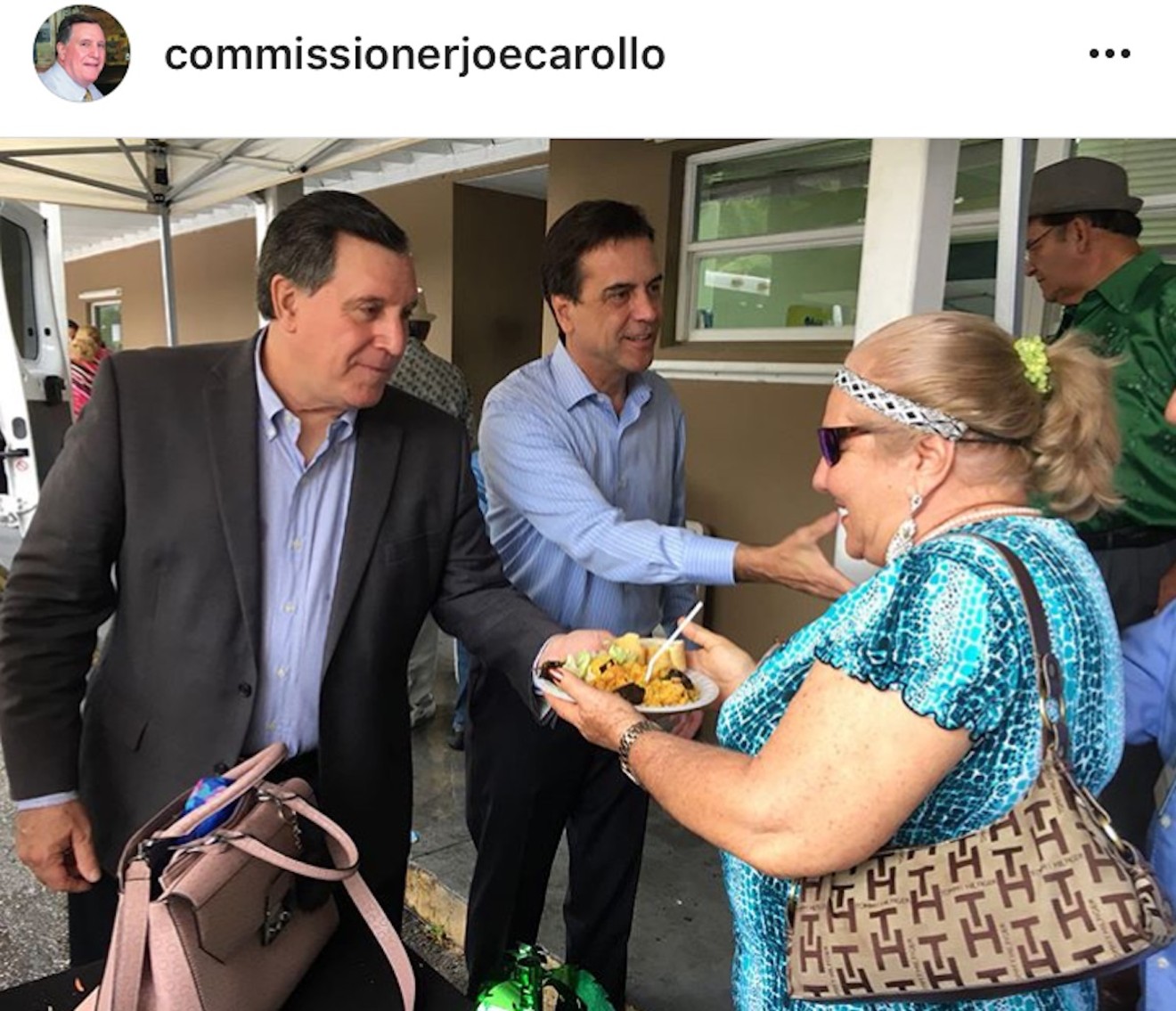 On May 19, 2018, Miami Commissioner Joe Carollo posted on Instagram this photo showing him handing out paella alongside county commission candidate Alex Diaz de la Portilla.