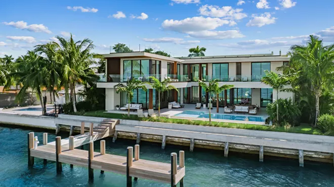 Back view of $38 modern mansion