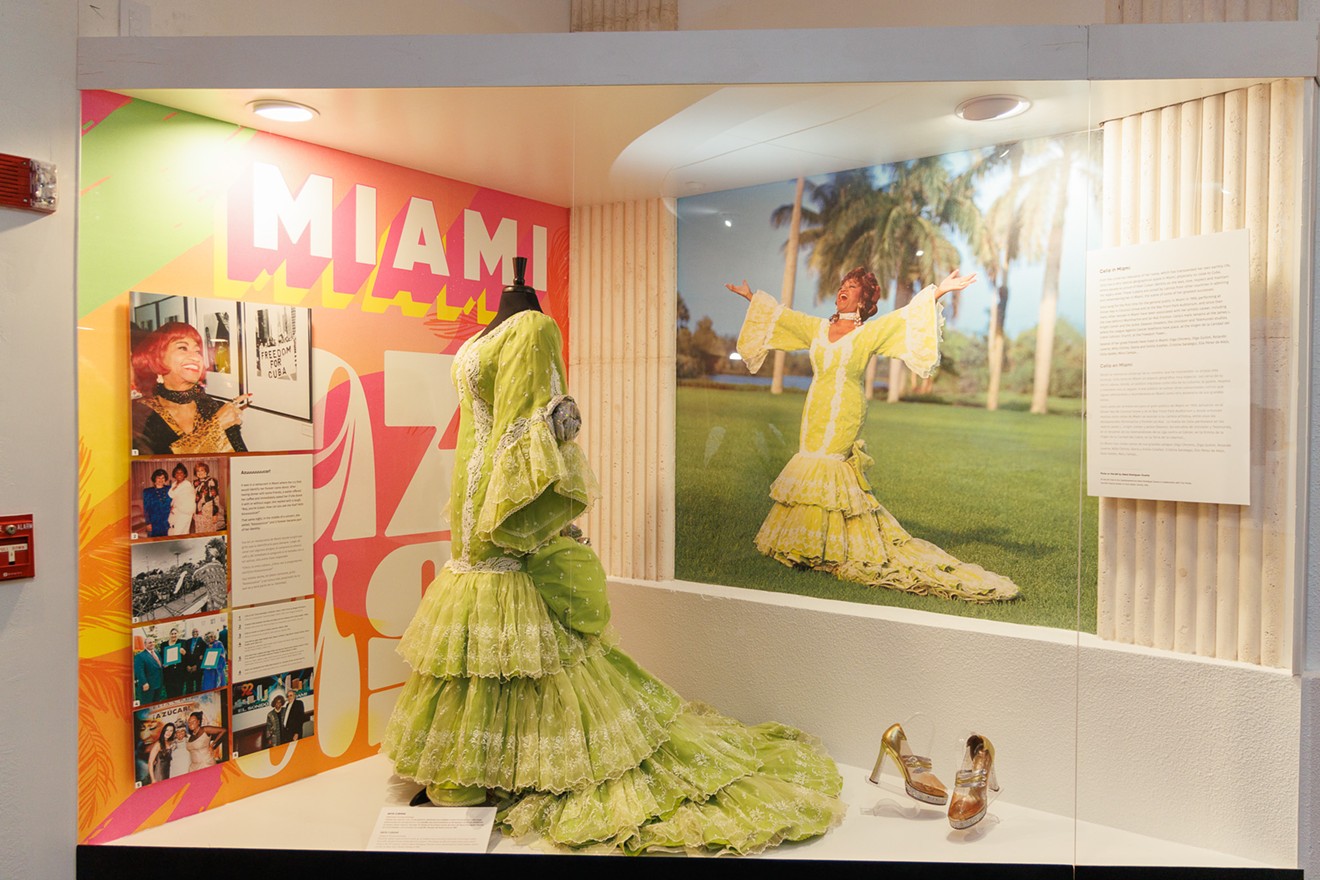 Celia Cruz's famous lime green Cuba dress is on display at the Tower Theater.