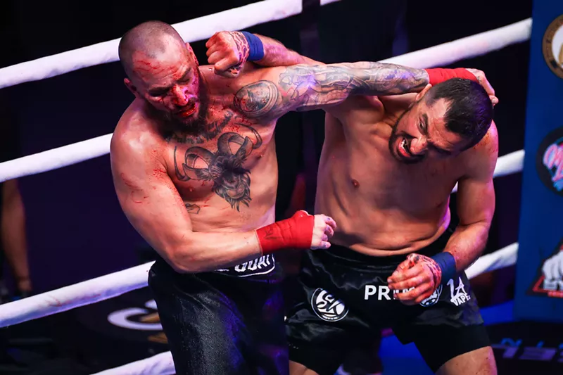 Image: Jose Fernandez (left) trades blows with Sam Liera at BYB Extreme's "Brawl in the Pines" in Pembroke Pines on August 10, 2023.