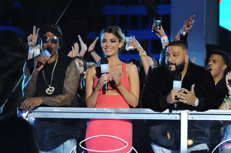 Image: Nick Cannon, Emily Sears, and DJ Khaled