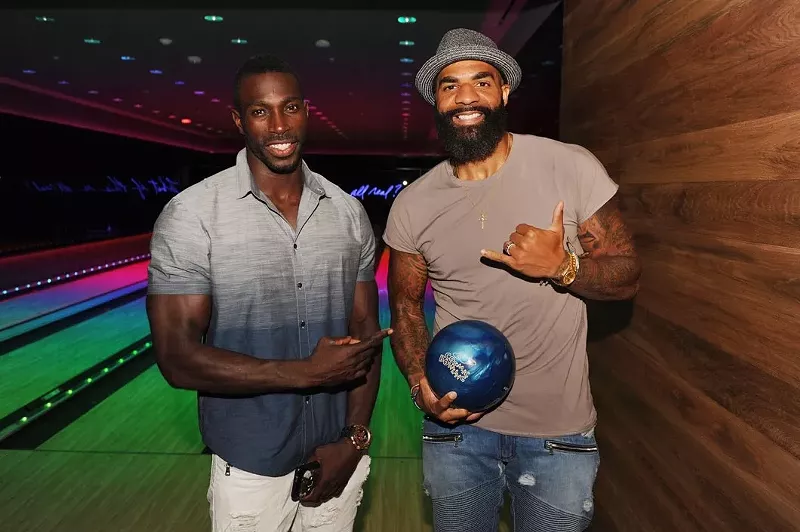 Image: Tony Thomas and Carlos Boozer