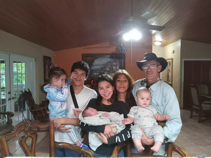 Image: The Cueli family poses for a photo