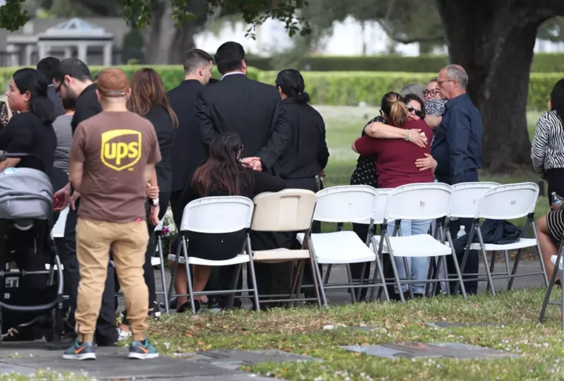 Image: A December 2019 burial for Frank Ordonez, the UPS driver killed in a shootout between police and two armed robbery suspects.