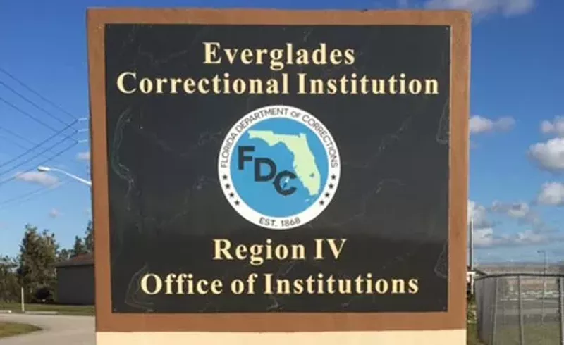 Image: A sign reads: Everglades Correctional Institution Region IV Office of Institutions