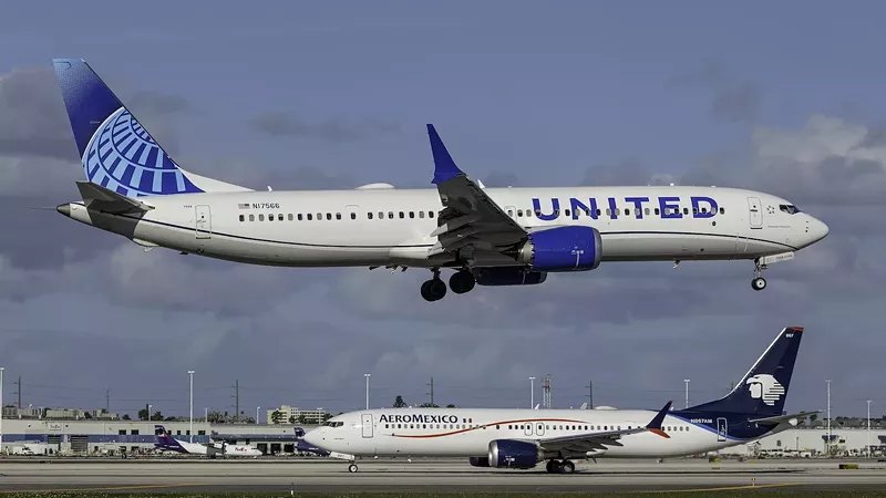 Image: photo of a united airlines boeing 737 max landing at miami international airport in 2024