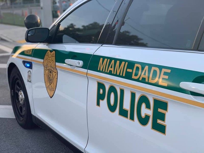A Miami-Dade police officer was charged with a single count of wire fraud for allegedly scamming a federal loan program.