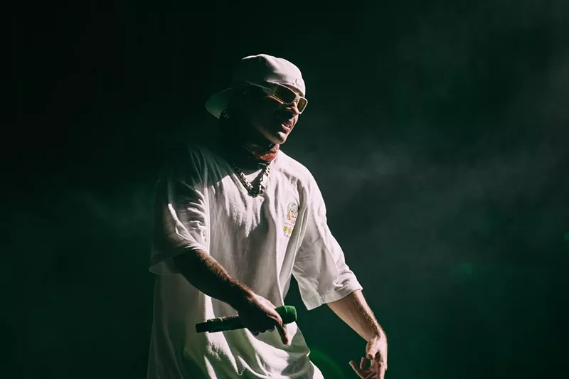 Image: Feid performing on stage