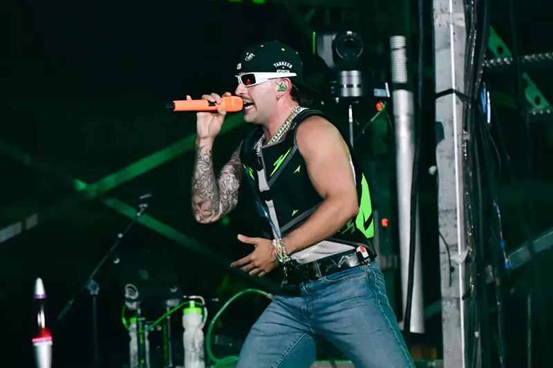 Image: Feid performing on stage at Hard Rock Stadium