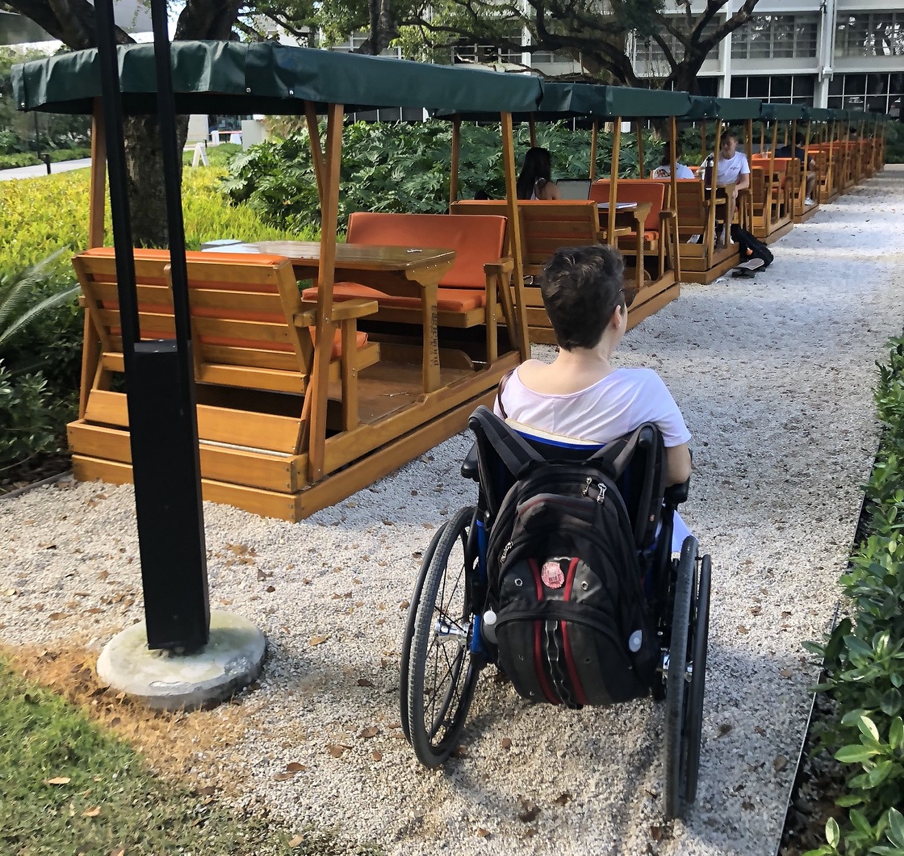 These fancy gliders at the University of Miami are inaccessible to people who use wheelchairs.