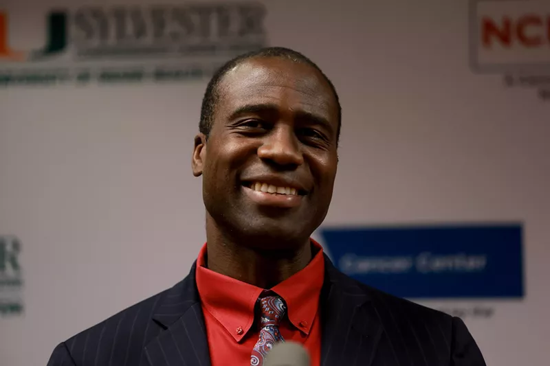 Image: Florida's Surgeon General smiles at a Miami press conference