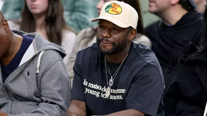 Floyd Mayweather Jr. watches during a 102-92 LA Clippers win over the Golden State Warriors at Intuit Dome in Inglewood, California, on December 27, 2024.