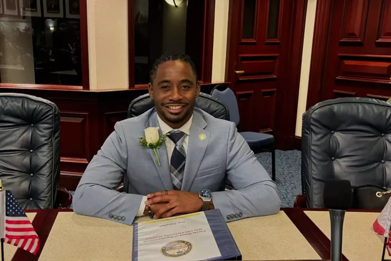 Image: Rep. Daryl Campbell smiles in his seat inside the Florida House of Representatives