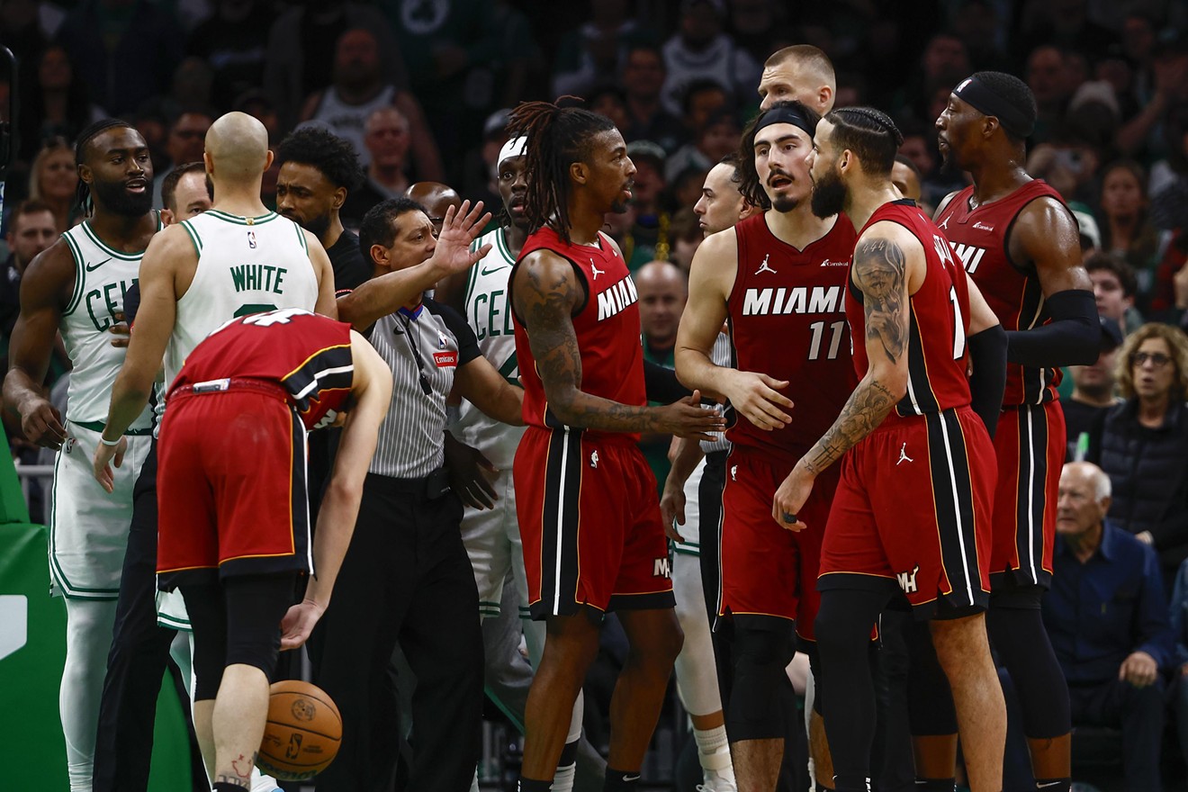 Players exchange words after Caleb Martin of the Miami Heat collided with Jayson Tatum in the fourth quarter of a first-round playoff matchup at TD Garden on April 21, 2024.