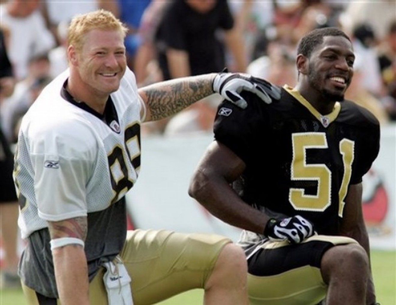 UM greats Jonathan Vilma (right) and Jeremy Shockey during their days playing for the Saints.