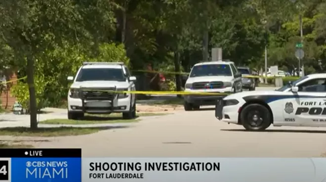 Screenshot of CBS Miami newscast showing Fort Lauderdale Police Department SUVs and caution tape on a street in Fort Lauderdale. The newscast banner reads, "Shooting Investigation Fort Lauderdale."
