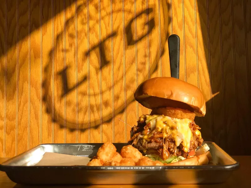 Image: After surviving a takeout and delivery-only environment for weeks, Legends Tavern & Grille fans can now enjoy its Cowboy Burger in-restaurant.