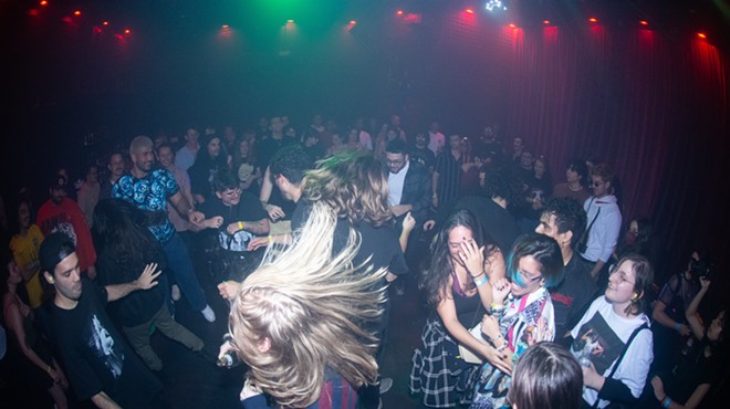 The crowd moshing at Freaky Friday's event at the Sandbox
