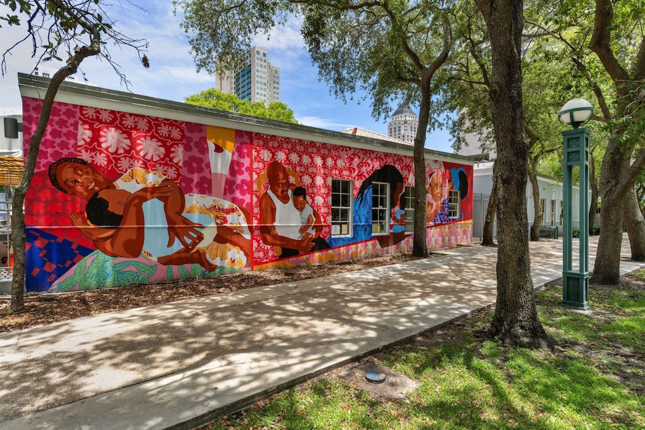 Mark Fleuridor’s mural covers one wall at the Carol Glassman Donaldson Childcare Center, across from the Miami-Dade Children’s Courthouse.