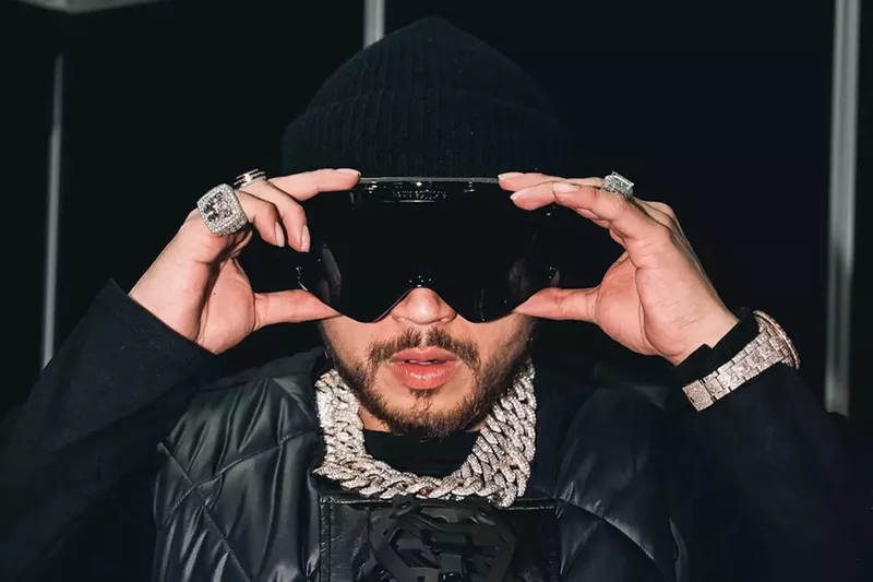 Image: Fuerza Regida frontman Jesus Oritz Paz in ski goggles and black beanie