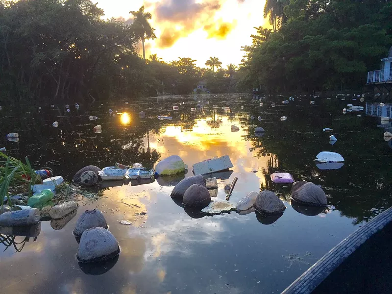 Image: Trash has been building up in the Little River.