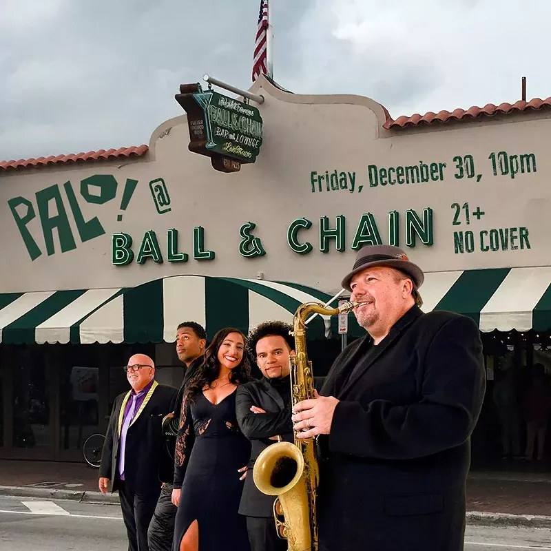 Image: Palo! and Ed Calle (far right) in happier days pose in front of Ball & Chain, where they will play Friday night.