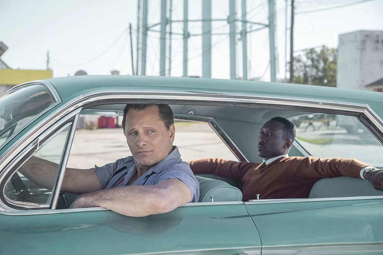 In Green Book,, Viggo Mortensen (left) plays Tony Vallelonga, also known as Tony Lip, an Italian-American nightclub bouncer who becomes the driver for accomplished African-American classical pianist Don Shirley (Mahershala Ali).