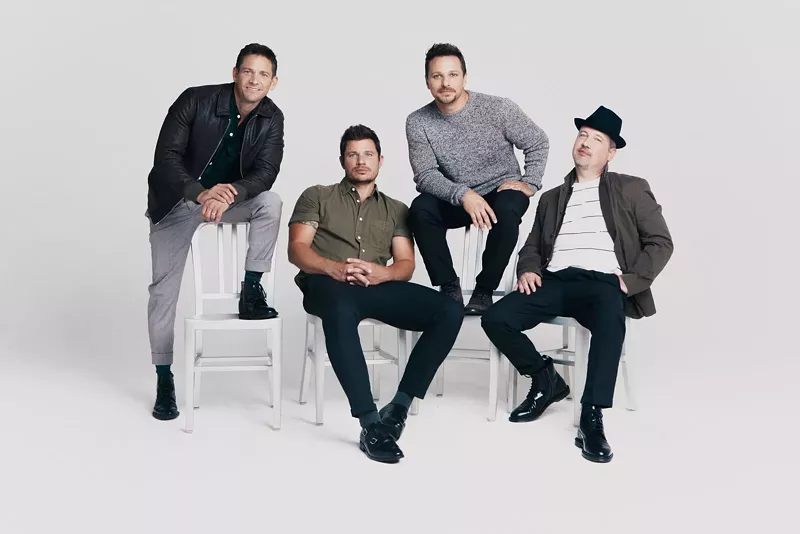 Image: 98 Degrees' Jeff Timmons (left), Nick Lachey, Drew Lachey, and Justin Jeffre