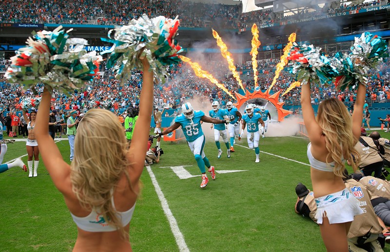 The Miami Dolphins enter the field prior to a game against the New York Jets at the Hard Rock Stadium in 2016.