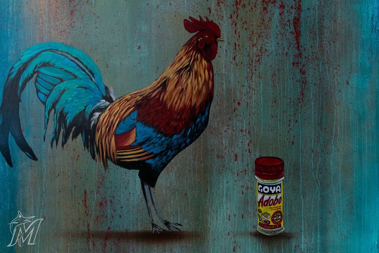 Luis Valle's rooster and Goya spice bottle adorn a wall near Marlins Park's Goya: La Cocina concession.
