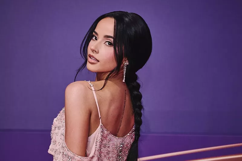 Image: Becky G posing on the red carpet of the 2025 Premio Lo Nuestro