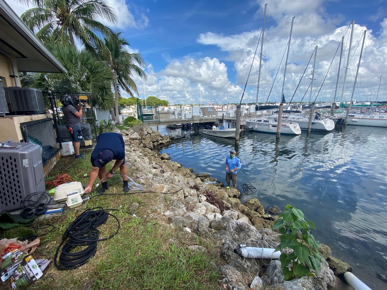 The Frost Science team deploys air pumps into Biscayne Bay.