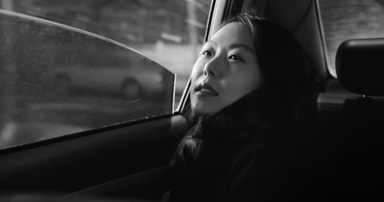 In The Day After, Kim Min-hee is back in another Hong Sang-soo film, this time as Ah-reum, the beautiful assistant to an acclaimed middle-aged writer and small publishing house owner named Kim Bong-wan (Kwon Hae-hyo).