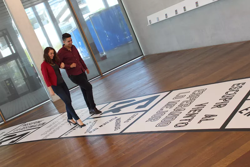 Image: Lawrence Weiner's Out of Sight installation at Pérez Art Museum Miami.